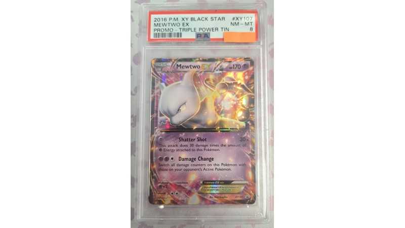 2016 Pokémon XY Black Star: XY107 Mewtwo EX (Promo-Triple Power Tin) PSA NM-MT 8 (Ed. Ing)